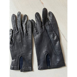 Real Kid Black Gloves Made in Italy, inside is silk. Size 7